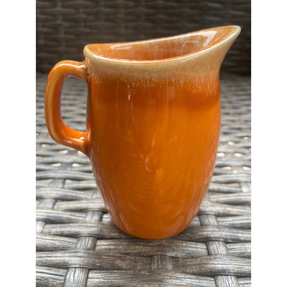 Vintage Hull pottery orange, tangerine drip glaze creamer made in the USA